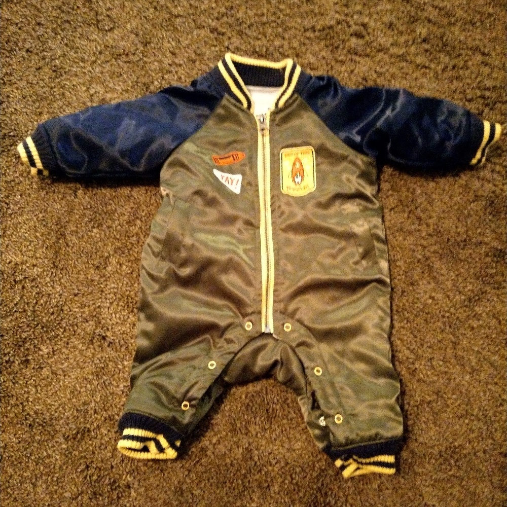 Brand new, never worn onsie